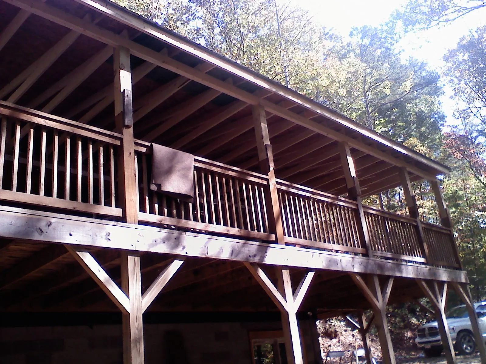 Timber framing under a new elevated porch and deck — Roof Leak Repair in Eva by Roofing Brothers